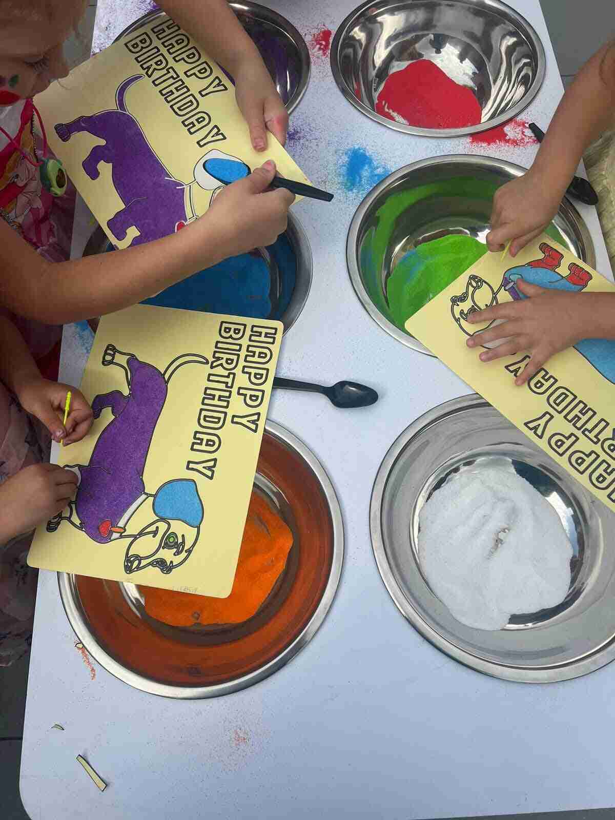 Participants engaging in Sand Art Workshops